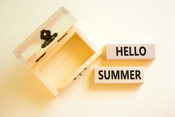 Hello summer symbol. Concept words Hello summer on beautiful wooden block. Beautiful white paper background. Empty wooden chest. Business lifestyle Hello summer concept. Copy space.