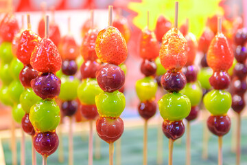 Beautifully arranged sugar-coated grape and strawberry. Tang Hu Lu