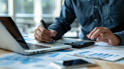 The accountant using calculator