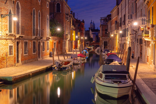 Typical Venetian canal with bridge at night, San Barnaba, Venice, Italy - Powered by Adobe