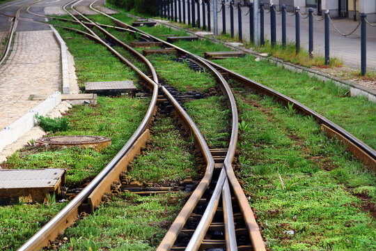 Combined dual gauge three-rail track. Standard gauge track used by trains and narrow meter gauge track used by trams in Zwickau, East Germany.