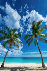Naklejka premium Two palm trees are standing on a beach with a clear blue sky above them