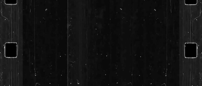 Film grain seamless texture. Retro template. Opacity or screen mode usage for overlay your video. Negative film. Scratched strip. Old fashion tape looped animation in 4K. Vintage film effects