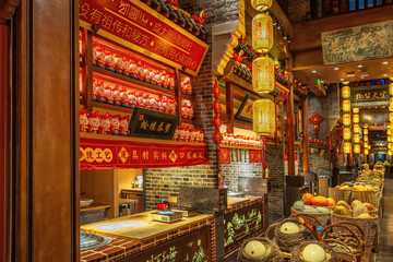 Illuminated Chinese Lanterns Above a Fruit Market Stall