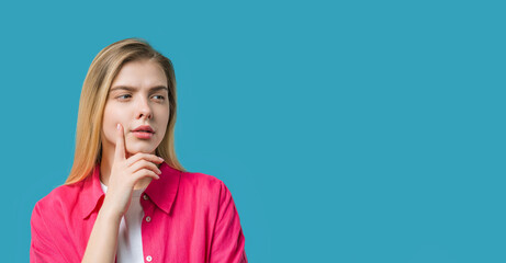 Thinking around woman on blue background. Puzzled lady looking for answer. Copy