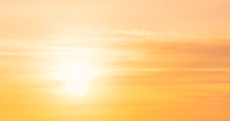 sunset sky clouds with orange sunlight in golden hour in the evening