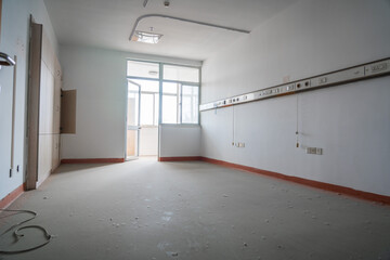 Spacious Empty Hospital Room with Sunlight