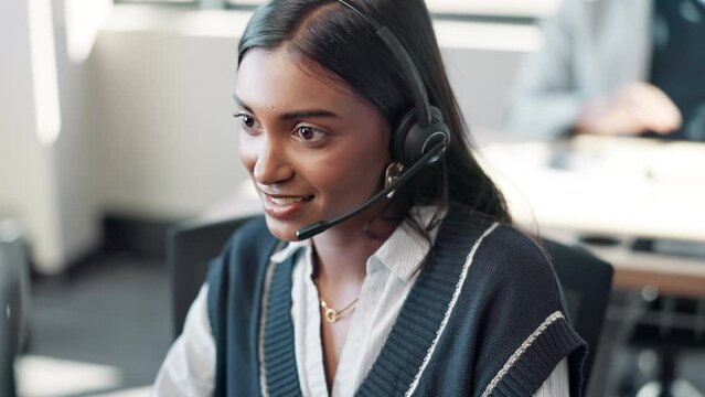 Face, Indian woman and computer at call center with chat for customer support and service. Office, crm and employee or consultant in conversation, telemarketing and communication at help desk