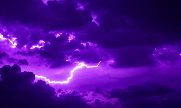 purple lightning in the sky at night