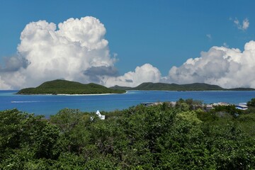 Blue sea and white clouds on a clear day.