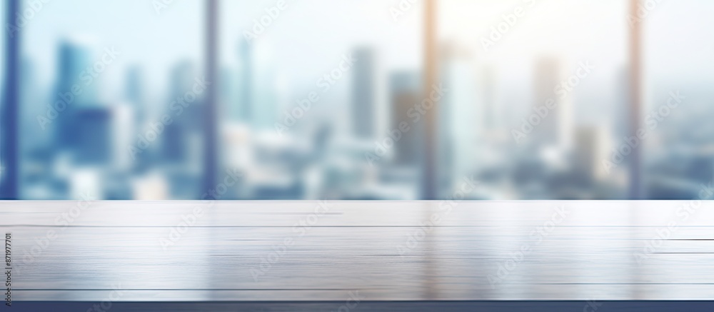 Aufkleber Blurry office background with table top featuring copy space image.