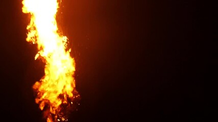 the flames of a fire eater in Thailand