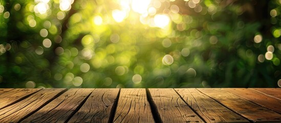 Wooden deck table with a blurred green background, ideal for showcasing products in a copy space image.
