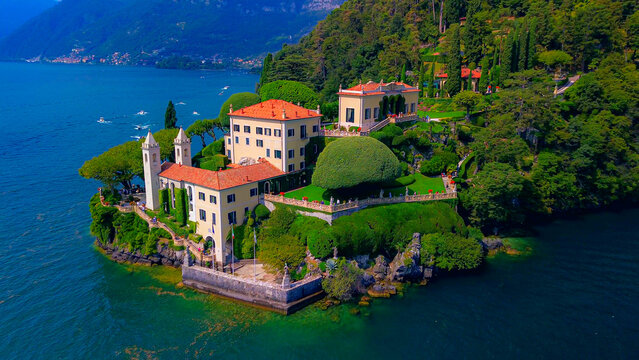 Aerial view of the luxury Villa Balbianello with terraced gardens, on the rocky wooded peninsula of Lavedo on Lake Como, panorama, picturesque residence. Green Planet. Nature. Lenno Italy 11.04.2025