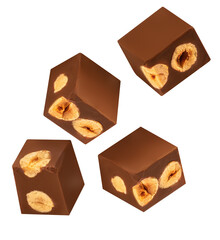 Flying Cubes of milk chocolate bar with hazelnuts isolated on white background.