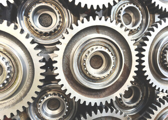 Gear and spare parts background. Workshop of a automotive factory for production of automotive gear and spare parts. Production of gears for automobile gearboxes for trucks. Small sharpness