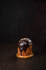 Easter cake with white icing on a black background