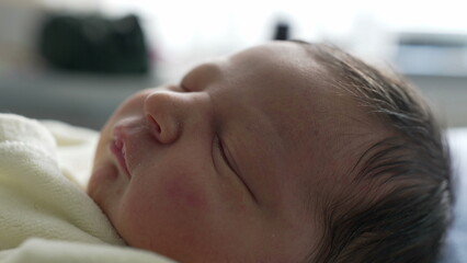 Newborn baby peacefully sleeping, showcasing soft skin and serene expression, dressed in a cozy yellow outfit. Emphasizing themes of tranquility, innocence, and new beginnings