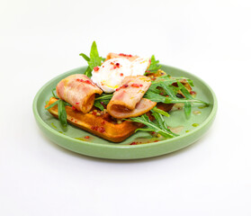  Hearty breakfast: waffles with bacon and poached egg