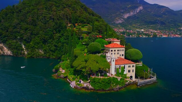 Aerial view of the luxury Villa Balbianello with terraced gardens, on the rocky wooded peninsula of Lavedo on Lake Como, panorama, picturesque residence. Green Planet. Nature. Lenno Italy 11.04.2025