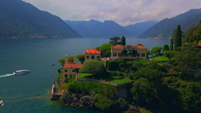 Aerial view of the luxury Villa Balbianello with terraced gardens, on the rocky wooded peninsula of Lavedo on Lake Como, panorama, picturesque residence. Green Planet. Nature. Lenno Italy 12.07.2024