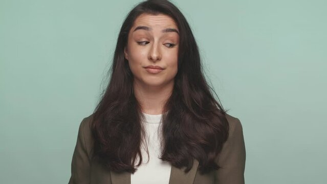 An anonymous woman's portrait captures the emotional themes of discontent and contempt, evoking a powerful response.