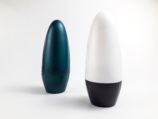 White and pearl green plastic roll on bottle isolated on white background. Roll on deodorant packaging