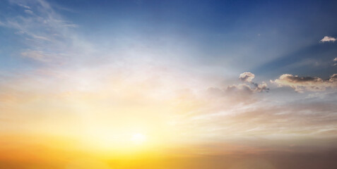 Sunset Sky Clouds in the Evening with colorful Orange, Yellow, Pink and red sunlight and Dramatic storm clouds on Twilight sky