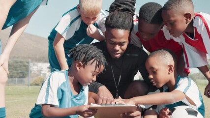 Coach, children and group with clipboard for soccer, formation or game plan with diversity on field. Man, football and kids in scrum with checklist for strategy, advice or mentorship for competition