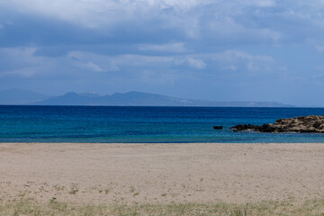 Panoramic view of the beautiful  turquoise Manganari beach in Ios Greece