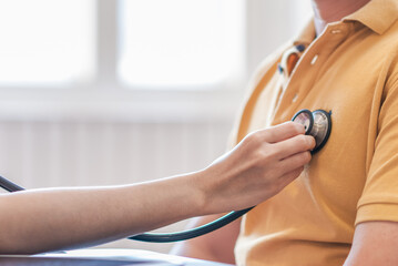 Doctors use stethoscope to listen patient heartbeat to find faults in heart disease. Doctors use...