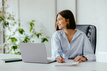 Young Professional Woman Working in Modern Office