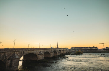 A stone bridge at sunset in vannes, france