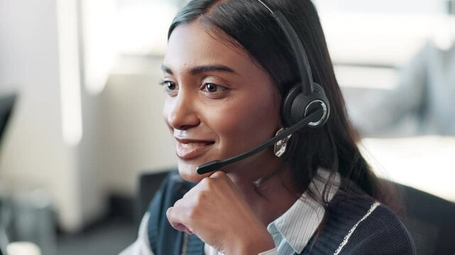 Employee, Indian woman and computer at call center with microphone for customer support or service. Office, crm and advisor or consultant in conversation, telemarketing and communication at help desk