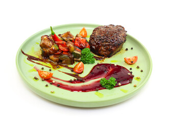 Juicy beef with grilled vegetables and cranberry sauce