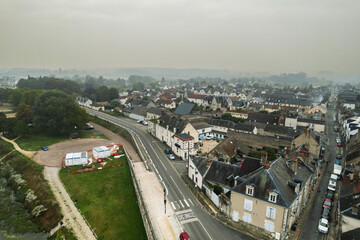Obraz premium A foggy morning over a french village