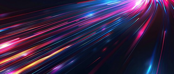 Vibrant, colorful light trails in motion, creating a dynamic and abstract visual effect against a dark background...