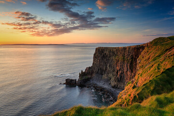 Beautiful sunset over the Cliffs of Moher in County Clare, Ireland.
