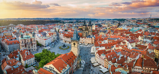 Panoramic aerial sunset view of the old city center of Prague, Czech Republic, with Tyn Church at...