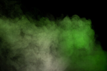 Green and white steam on a black background.