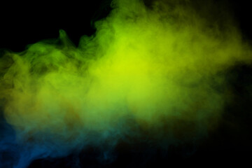 Blue and green steam on a black background.