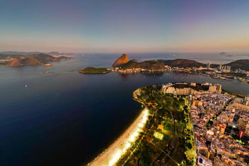 Fototapeta premium Aerial View of Rio de Janeiro City With Flamengo Beach and Sugarloaf Mountain on Sunset
