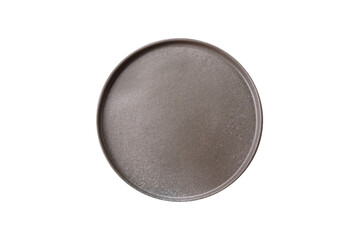 Empty ceramic round plate on dark textured concrete background