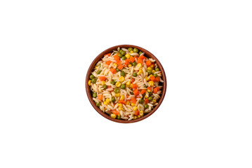 Delicious boiled rice with vegetables corn, carrots, peas with salt