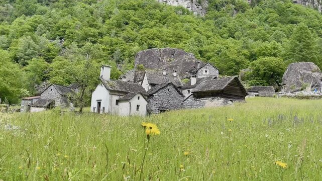 Panoramic view of traditional stone village Sabbione in Val Bavona, Vallemaggia, Switzerland. High quality 4k footage