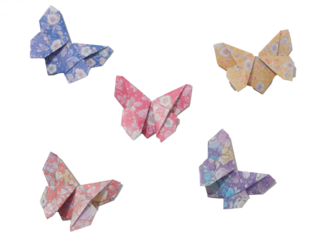 Five different origami butterflies made from colorful floral patterned paper. Folded paper animals figures.