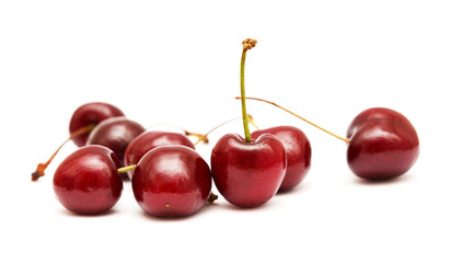 Dark red sweet cherries isolated on white background