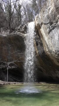 Waterfall Visor in Crimea in spring, waterfall, beautiful waterfall Visor in the Baydar valley of Crimea