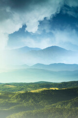 Fototapeta premium fantasy landscape with mountains and clouds