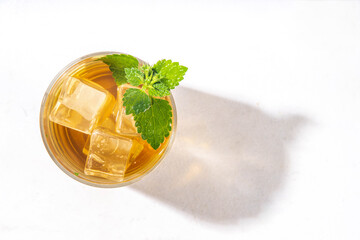 Herbal flower Deaf nettle ice tea, infused aromatic cold drink with dead nettle wildflower and ice cubes, copy space